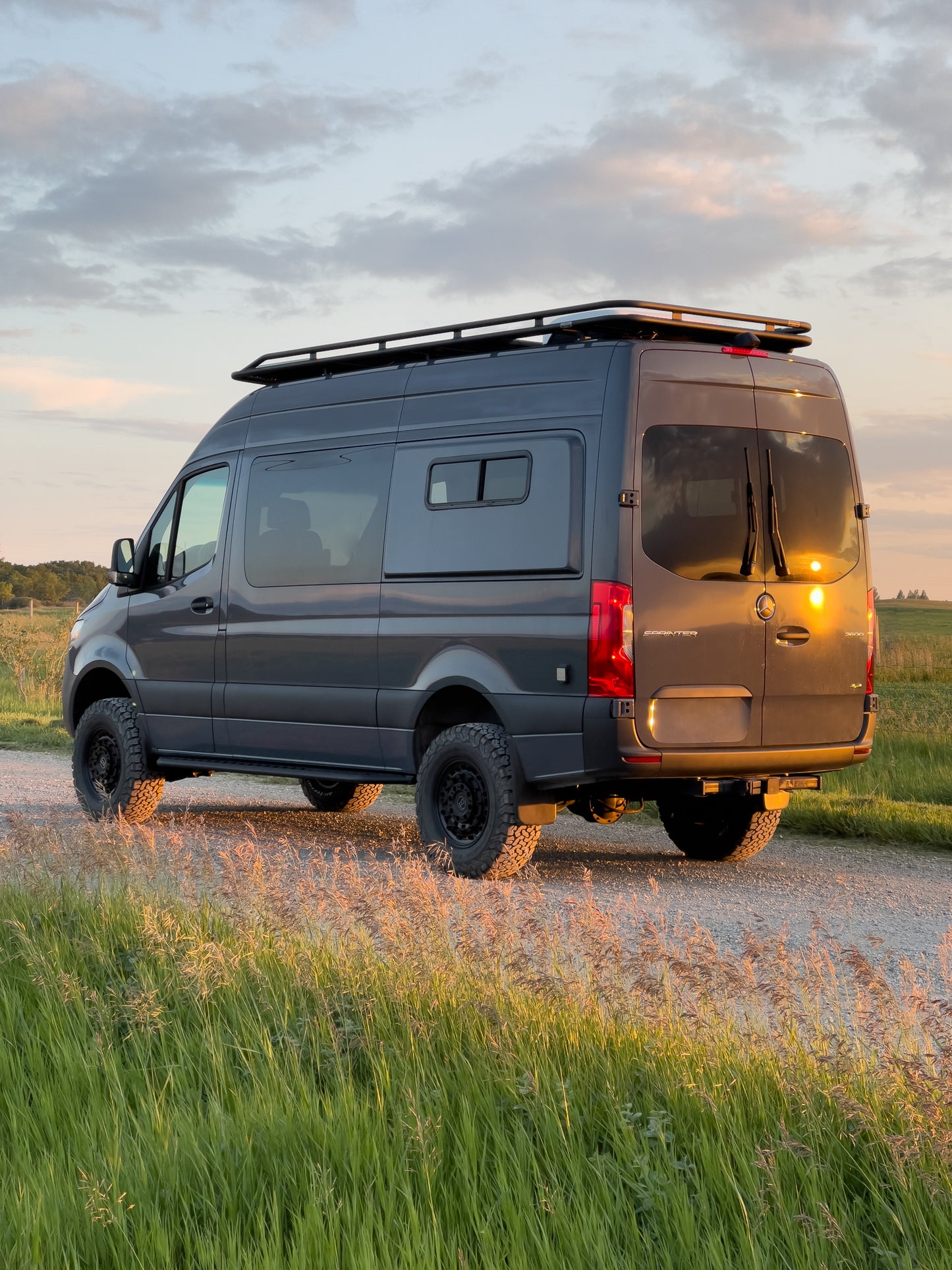 Van equipped with Eagle Series Sprinter Roof Rack