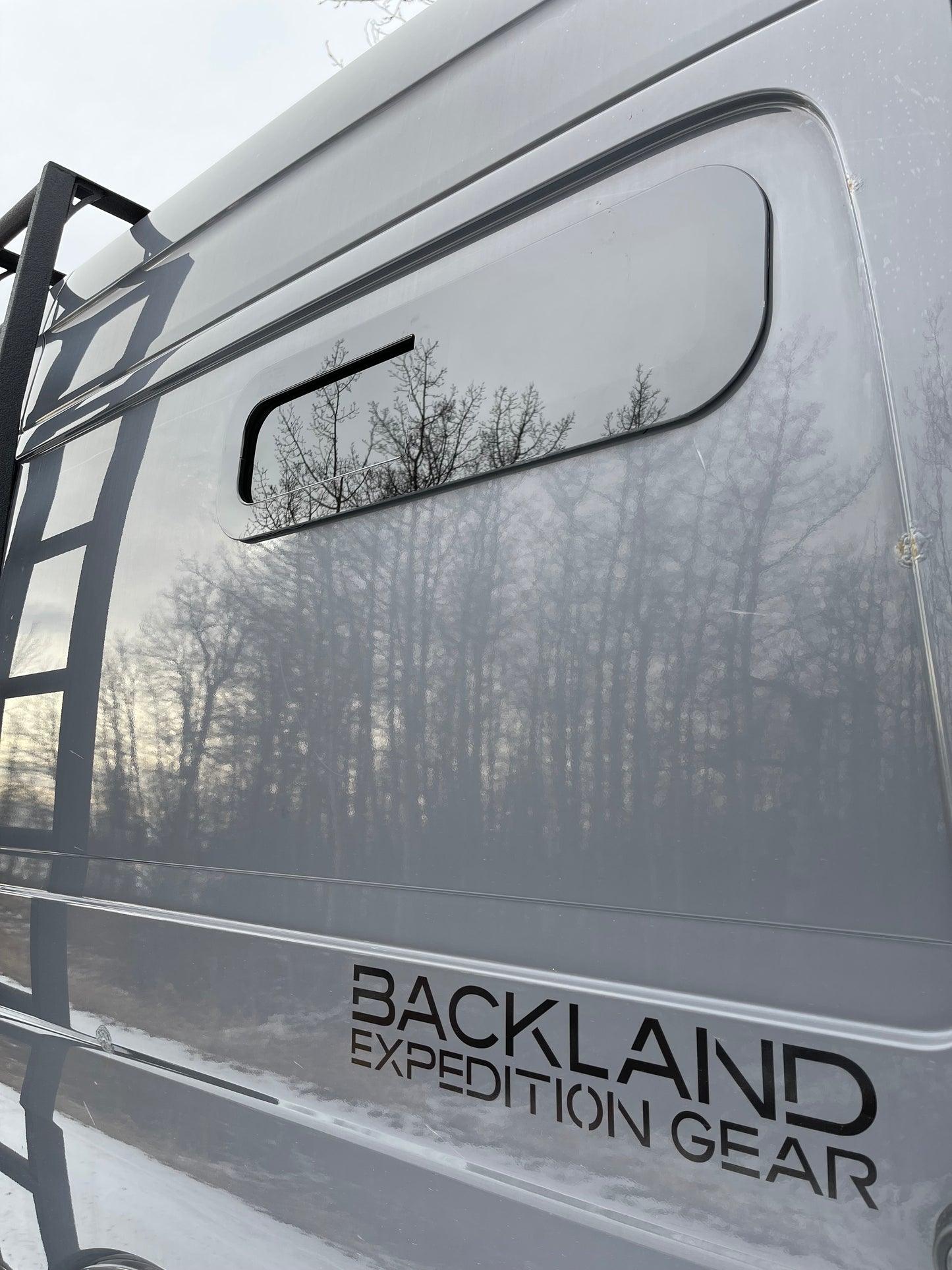 INSTALLATION: Small Window into Van Panel