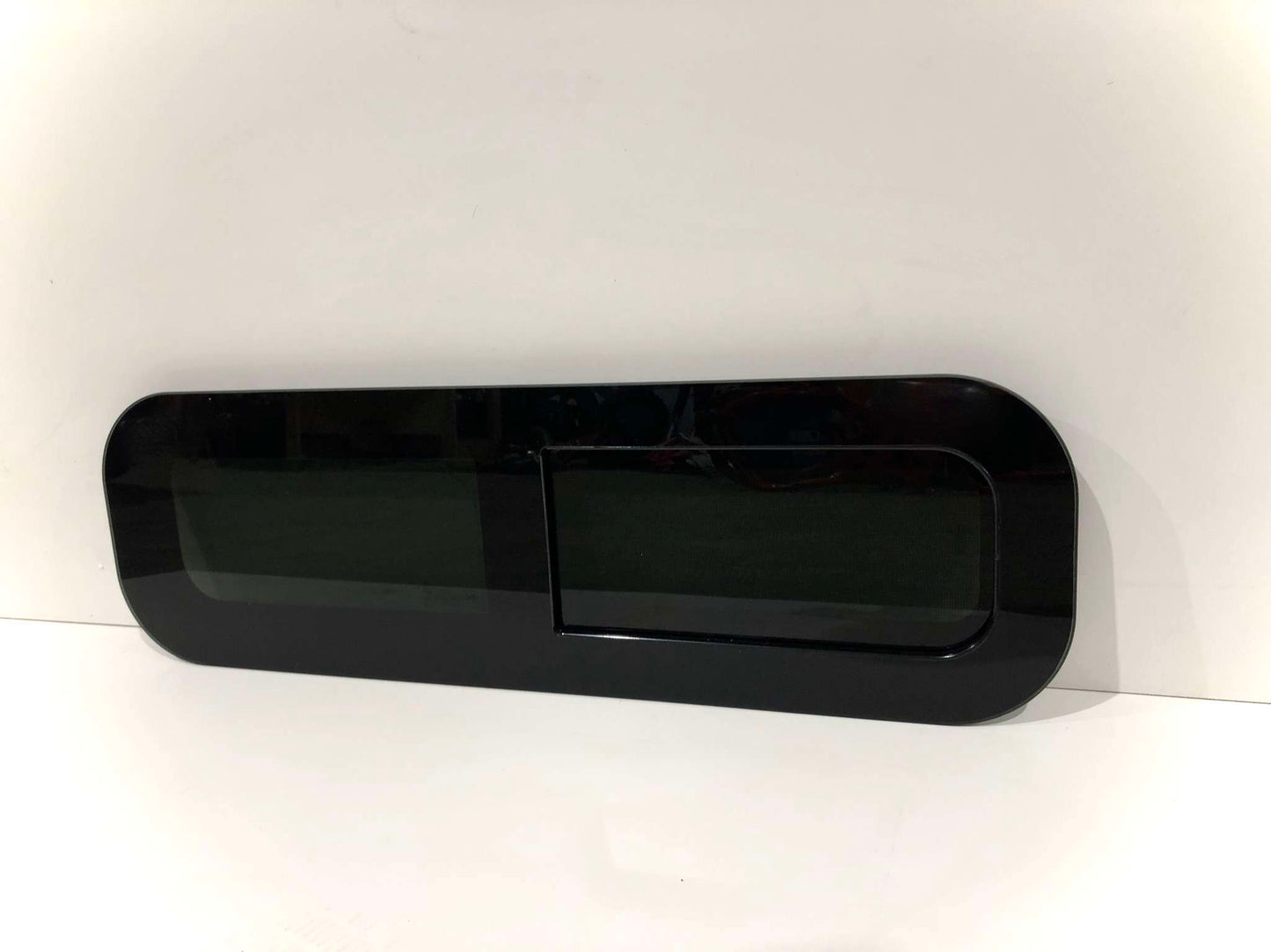 AMA Sliding Van Window before it is installed on a van.