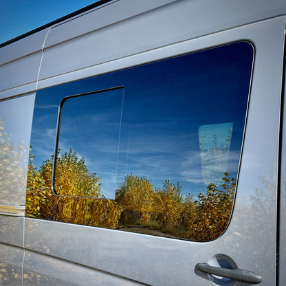 Reflection of trees in AMA custom van windows
