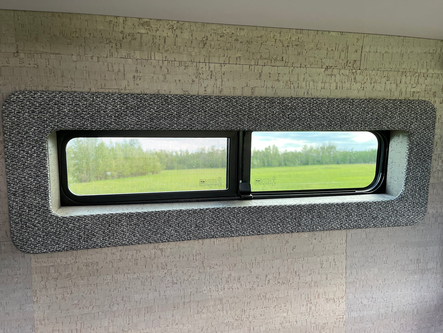 Interior view of the AMA sliding window for van.