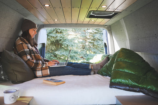 Keeping warm inside a Sprinter Van with Enlightened Equipment's Accomplice 2 person backpacking quilt.
