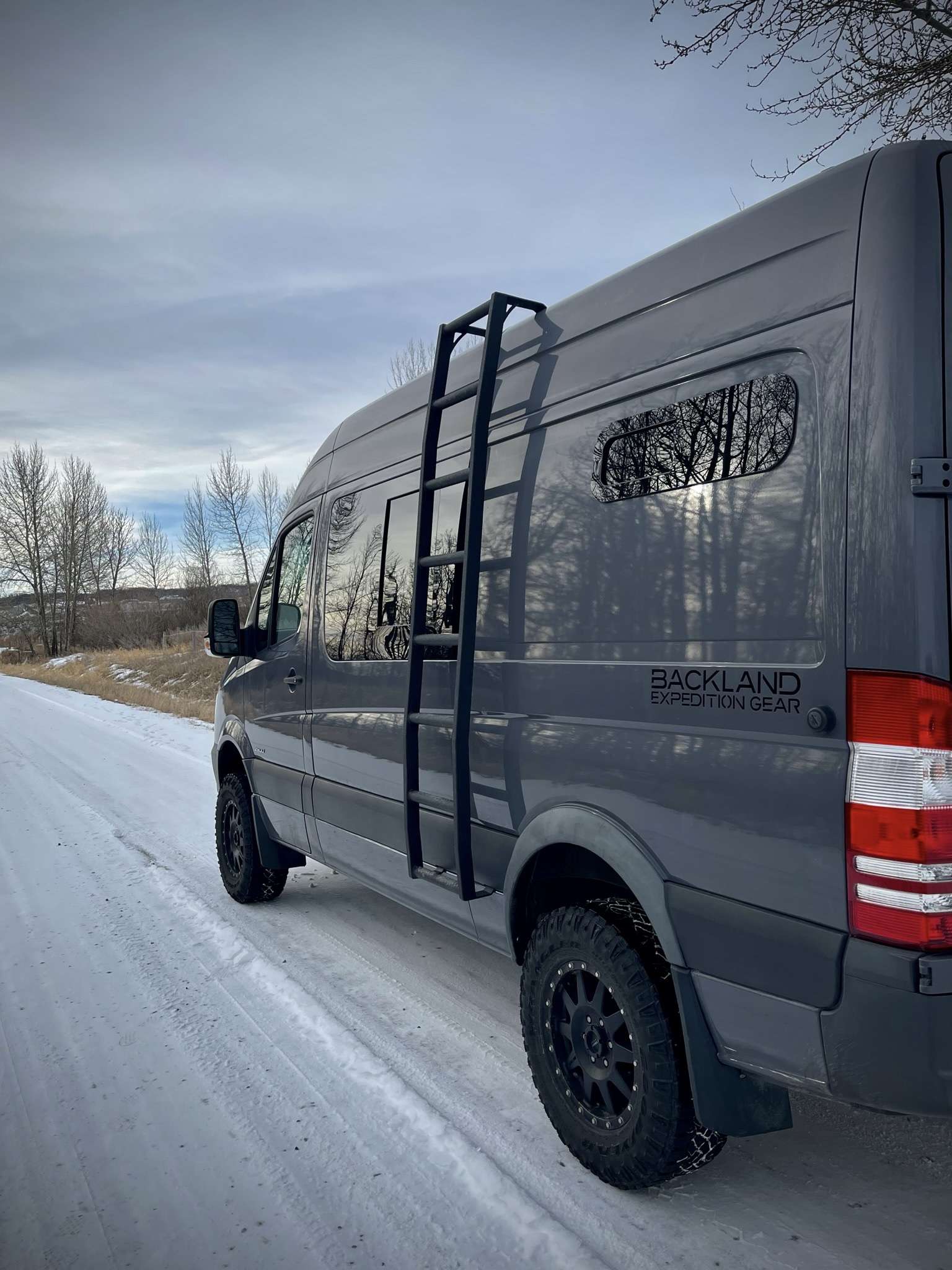 Sliding Van Window on a Sprinter Van in snowy conditions.